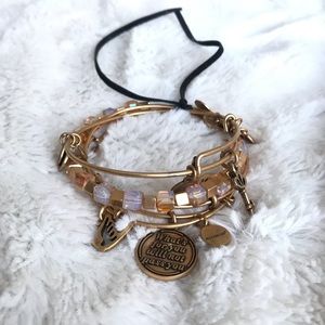 Mix and match Alex and Ani charm gold bracelets